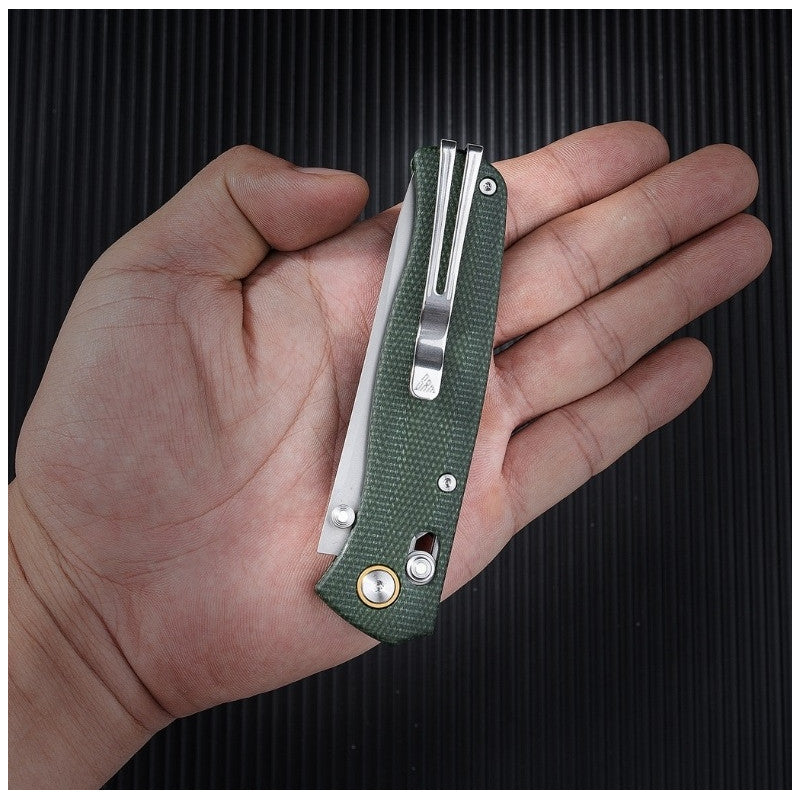 SRM Medal 255L-MG2 green Micarta folding knife size in hand